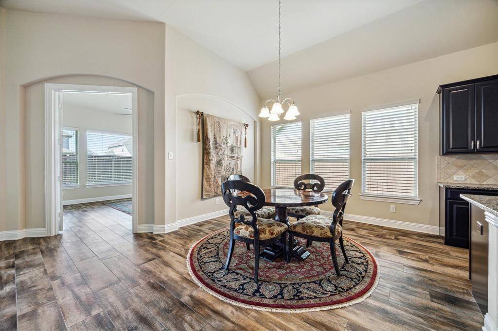 Bright breakfast nook with ample natural light, ideal for morning coffee.