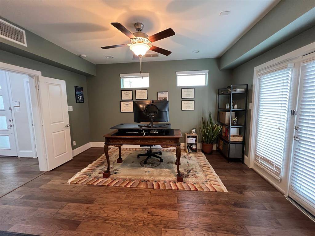 Alternate view of 1st floor bedroom with double doors leading to outside.