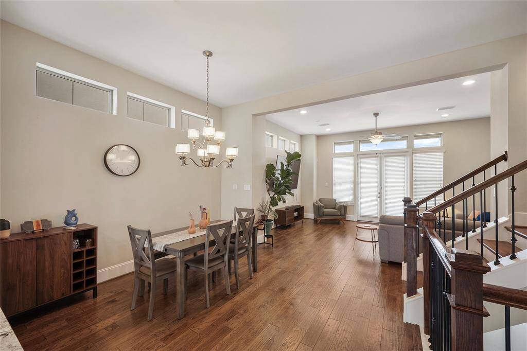 Alternate view of generous dining space open to living room.