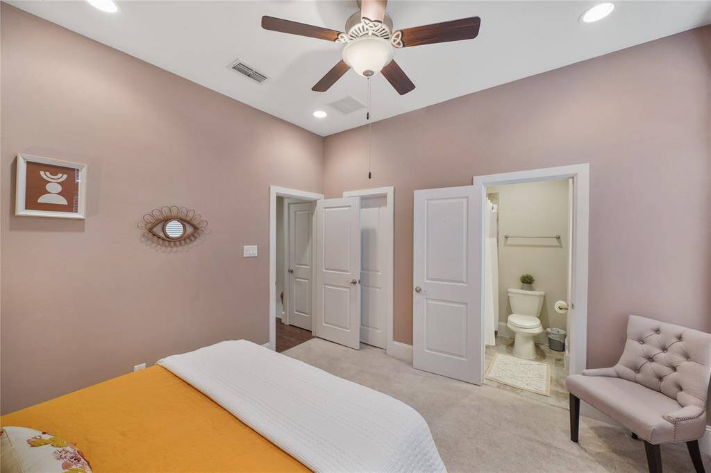 Inviting guest bedroom with private en suite bathroom.