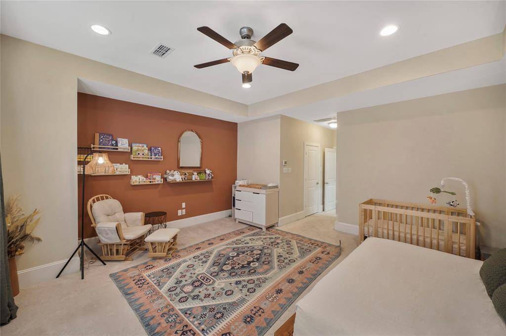 Alternate view of primary bedroom with closet number 2 by the entry.