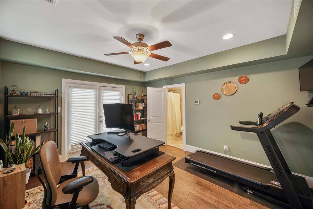 Bright and versatile downstairs bedroom with ample space and natural light.