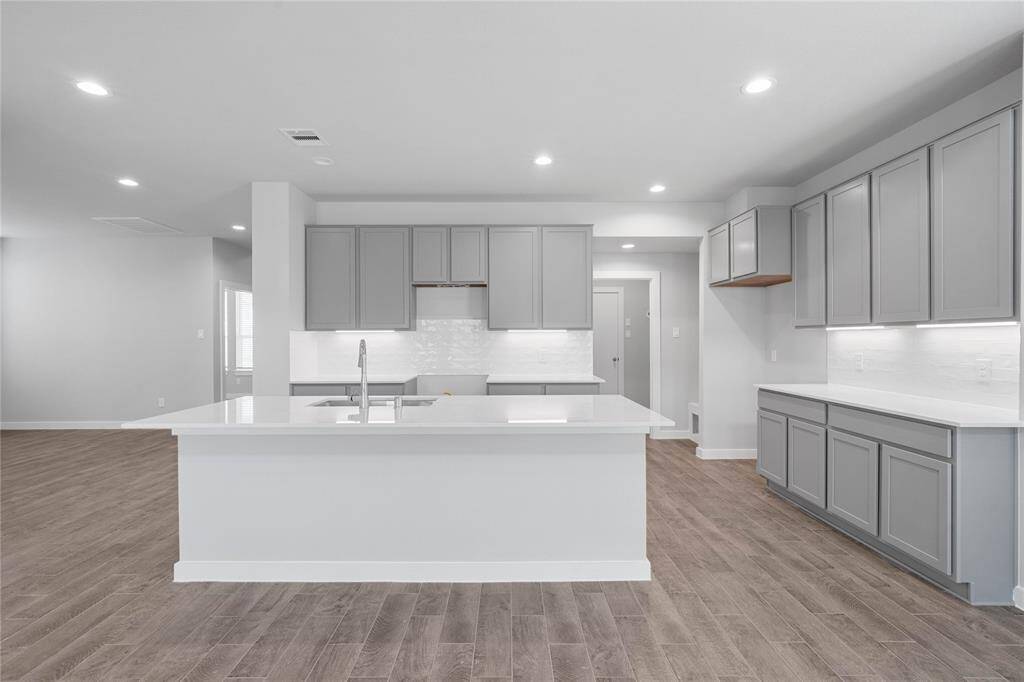 This photo is for illustrative purposes only and is not to be considered an exact replica of the finished home. Rendering does not match the finished product in terms of features, colors, landscaping, etc. Pricing, specifications, square footage and materials are subject to change at any time and without notice.