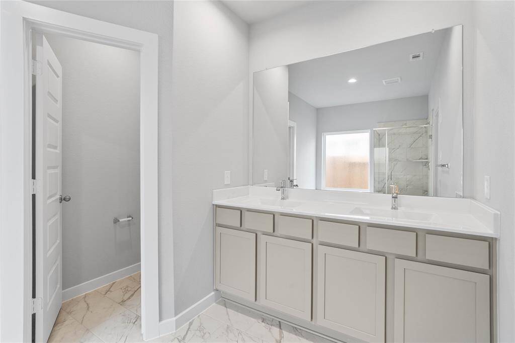 This photo is for illustrative purposes only and is not to be considered an exact replica of the finished home. Rendering does not match the finished product in terms of features, colors, landscaping, etc. Pricing, specifications, square footage and materials are subject to change at any time and without notice.