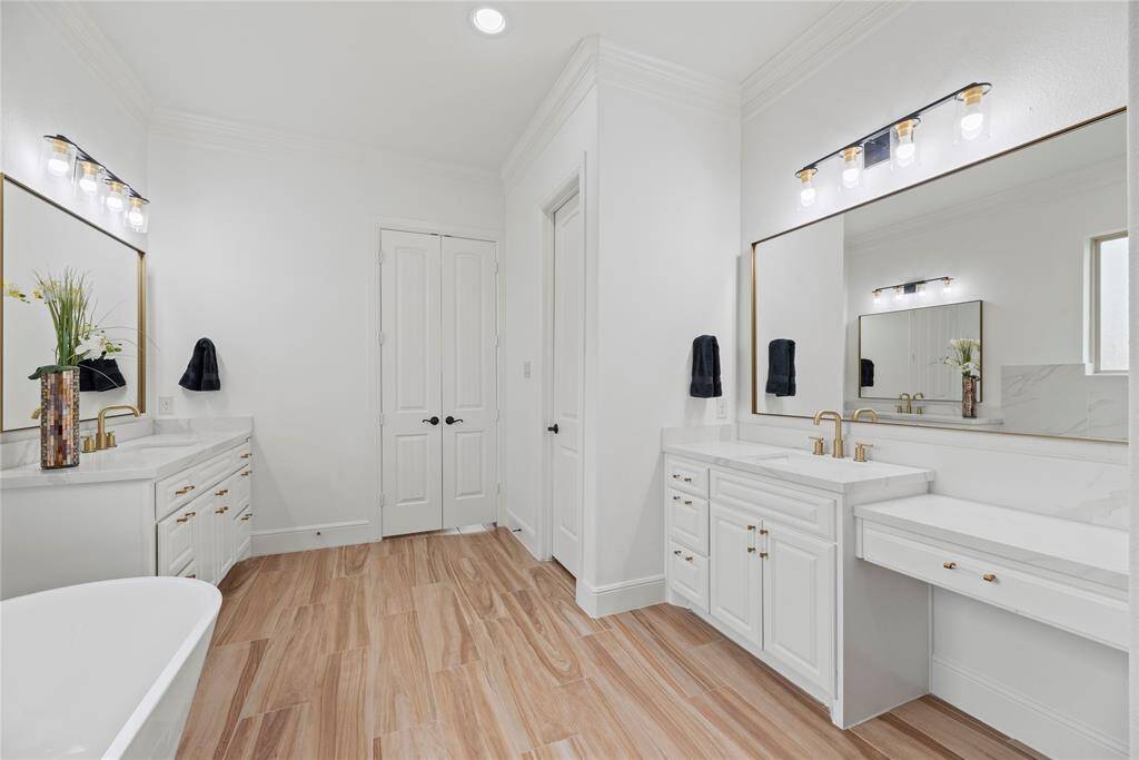 Dual vanities in your primary bath, offer personal space with tons of dedicated cabinet space.