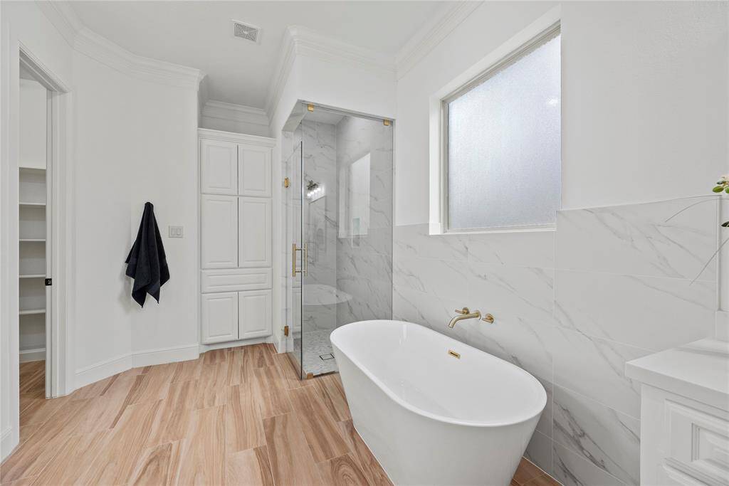 Relax in your deep soaking tub or opt for a quick rinse in the separate shower.
