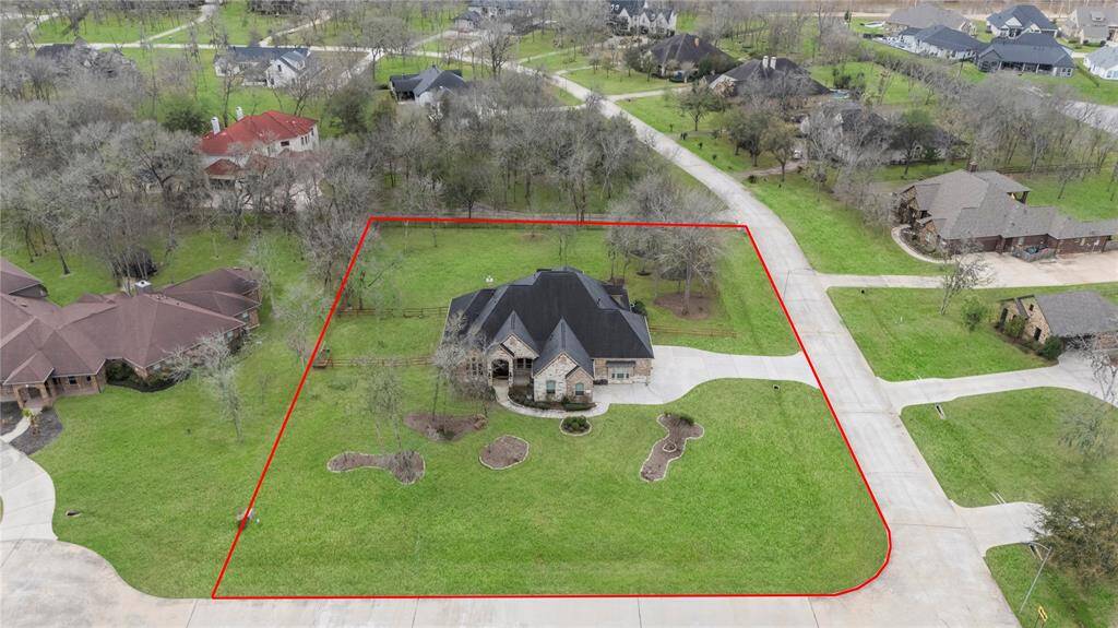 This impressive aerial view showcases the prime location of this cul-de-sac lot, perfectly positioned.