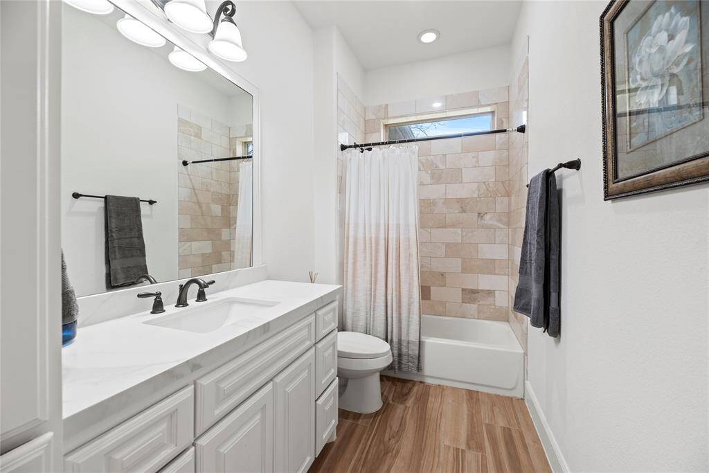 The third full bath with large vanity ensure private space for everyone.