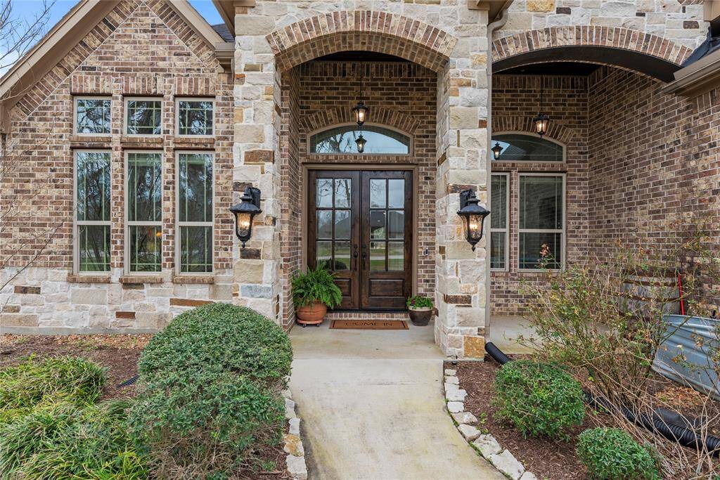 Beautiful stone and brick exterior combine to create a welcoming atmosphere.