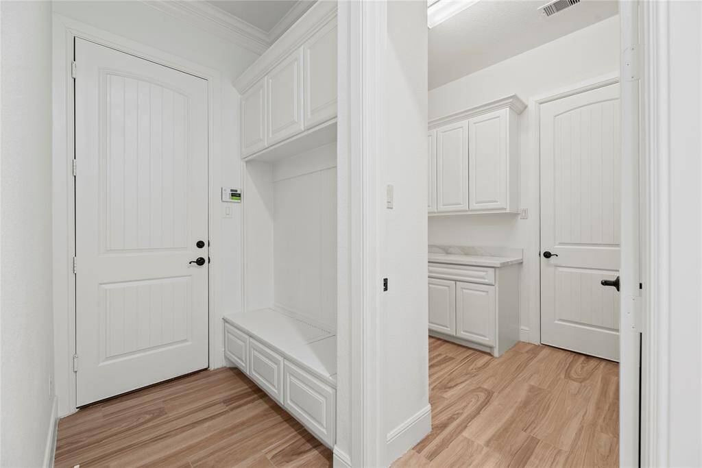 Mud room, smart storage solutions keep clutter at bay.