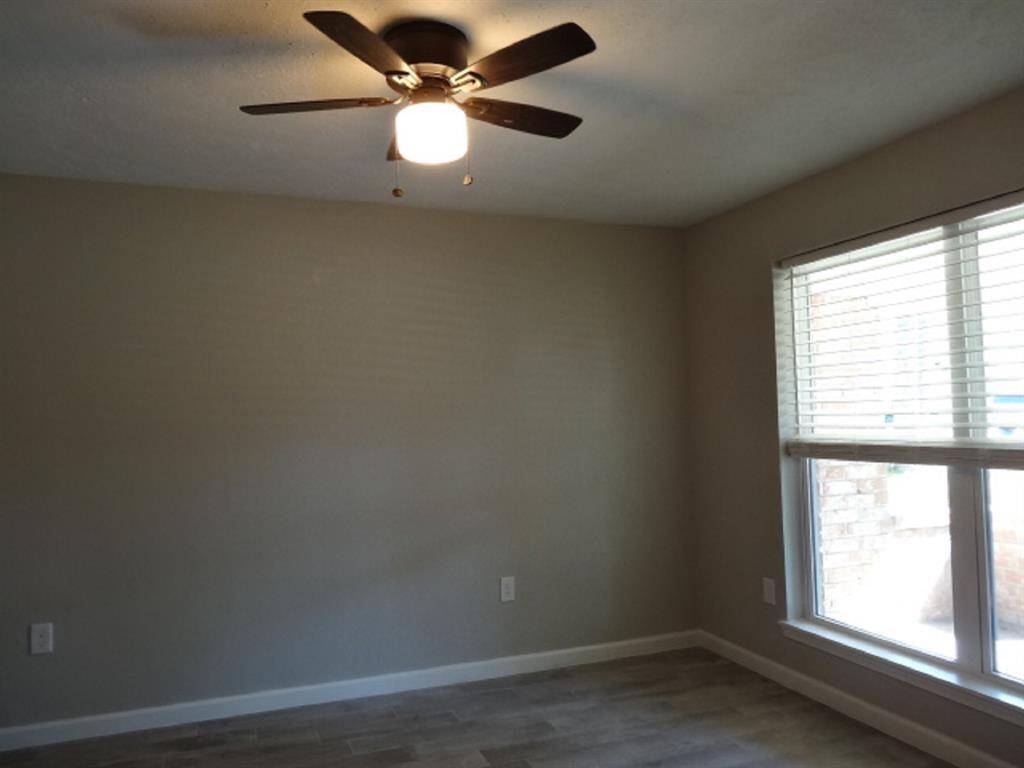 Dining room w/large window & tiled floor