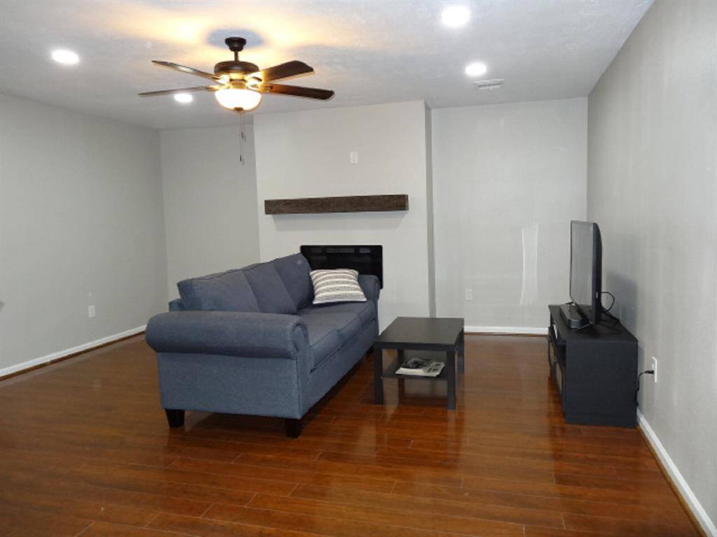 Family room w/faux fireplace