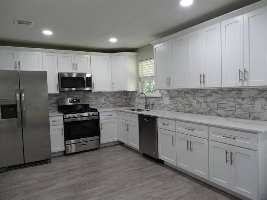 Lots of room to work in this updated, well-lit kitchen