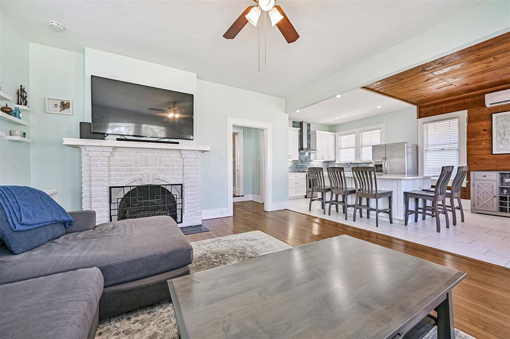 Living area looking into the fully remodeled kitchen.