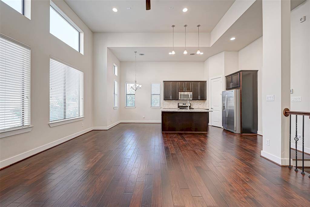 Another angle reveals the thoughtful layout connecting the living, dining, and kitchen areas. This perspective showcases the spaciousness and how the design maximizes both functionality and style for comfortable everyday living.