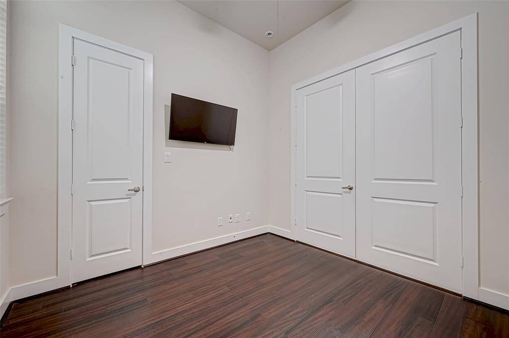 Bedroom 1 offers comfort and versatility with ample natural light and neutral tones, making it easy to personalize. Whether used as a guest room, office, or workout space, it’s a cozy retreat on the first floor.