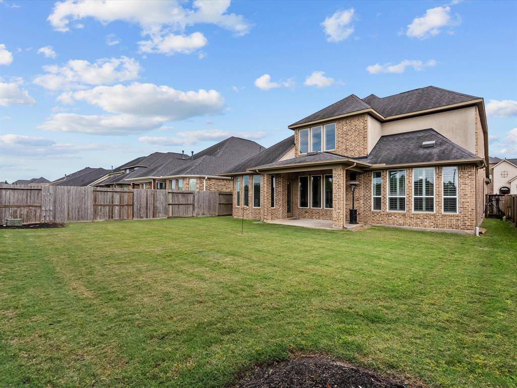 Nice size back yard with a covered patio and no back neighbors