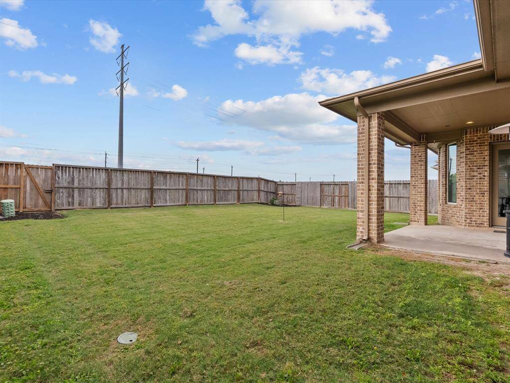 Nice size back yard with a covered patio and no back neighbors