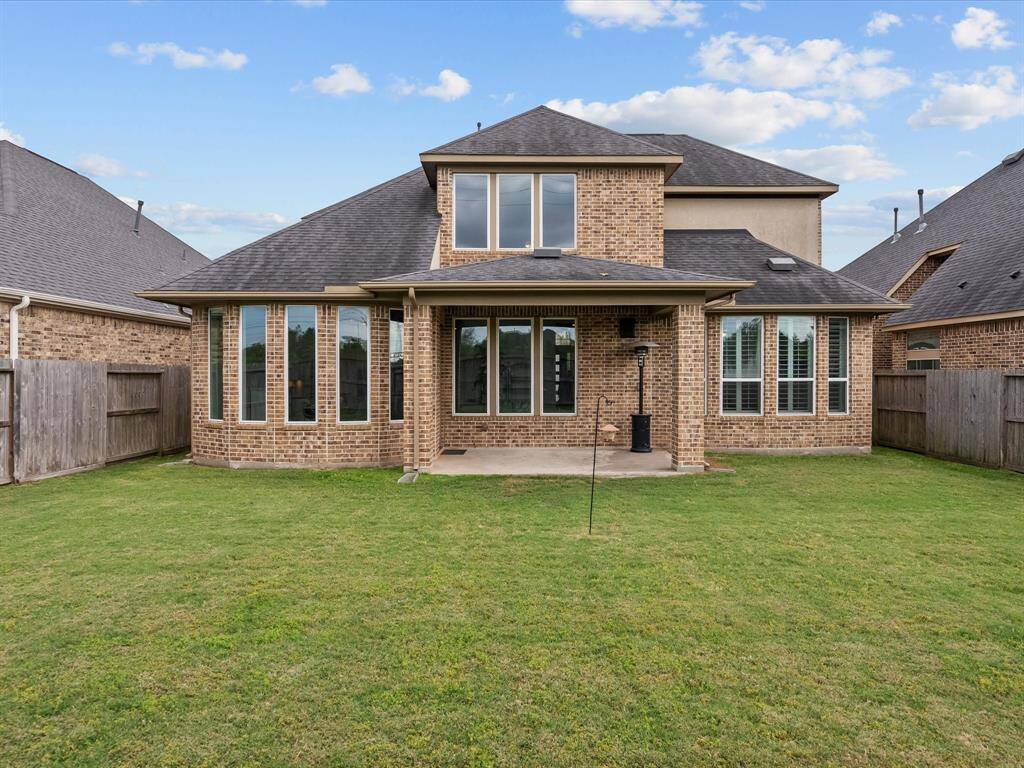 Nice size back yard with a covered patio and no back neighbors