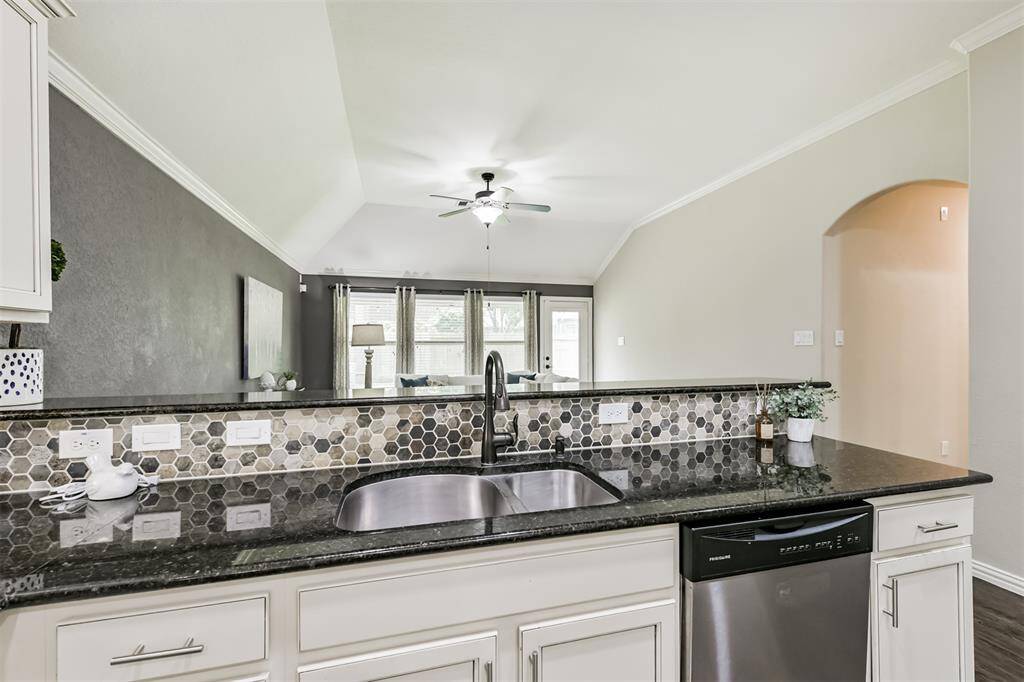 Views of the family room keep you chef connected