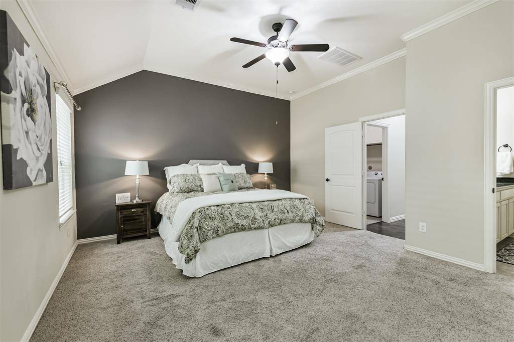 The split floor plan provides privacy for the owners' suite