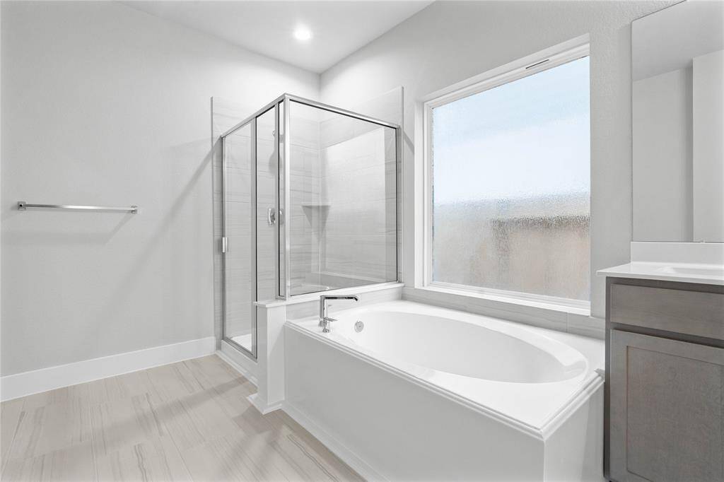This photo is for illustrative purposes only and is not to be considered an exact replica of the finished home. Rendering does not match the finished product in terms of features, colors, landscaping, etc. Pricing, specifications, square footage and materials are subject to change at any time and without notice.