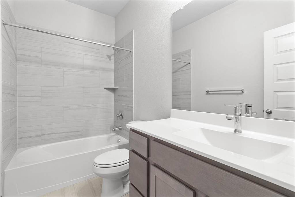 This photo is for illustrative purposes only and is not to be considered an exact replica of the finished home. Rendering does not match the finished product in terms of features, colors, landscaping, etc. Pricing, specifications, square footage and materials are subject to change at any time and without notice.