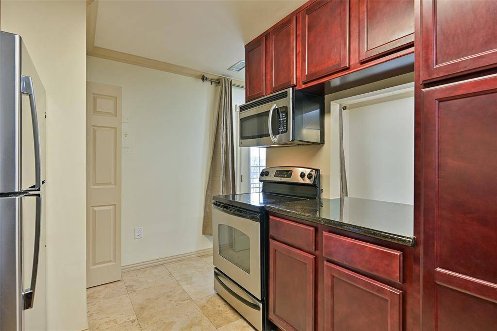 Generous cabinet space allows for convenient food and appliance storage.