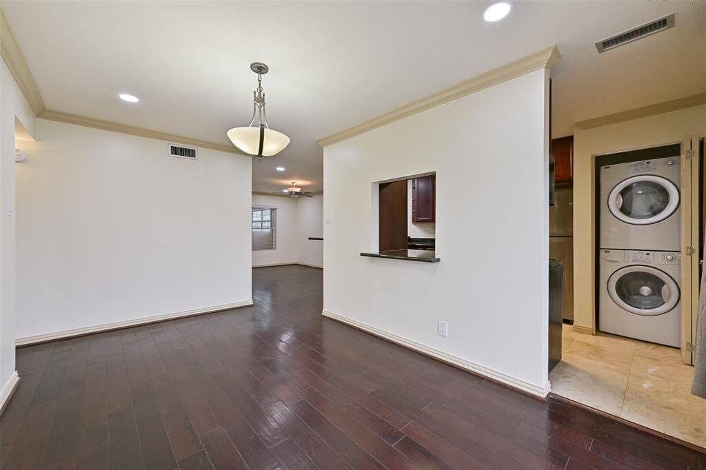 The dining area expands effortlessly into the living space, creating a perfect setting for gatherings.