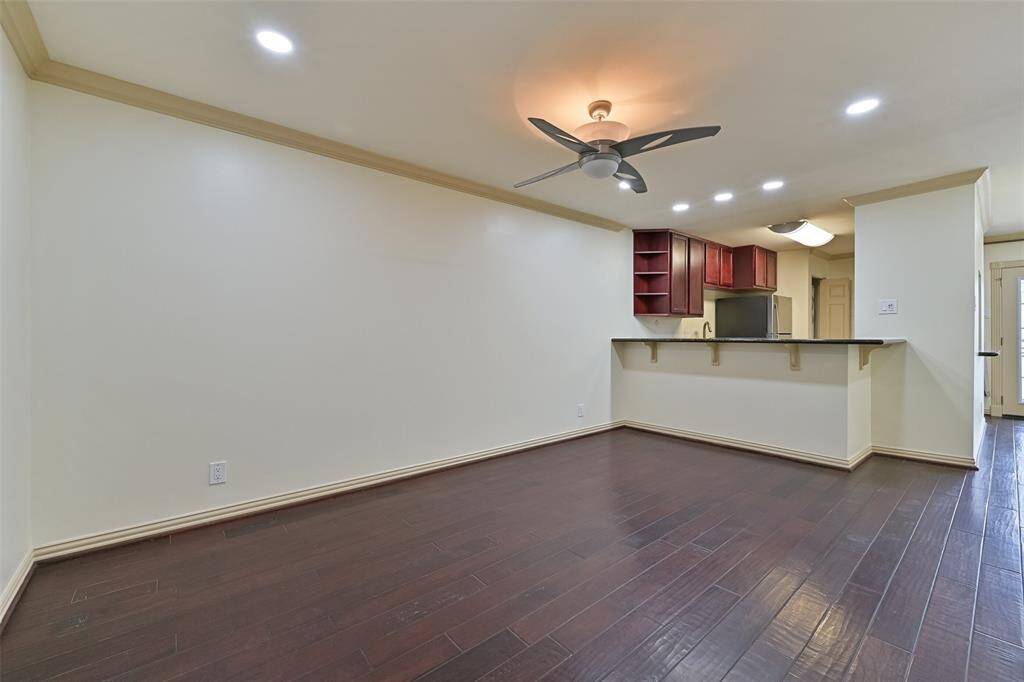 The open-concept layout allows the living area to flow seamlessly into the dining space, perfect for entertaining.