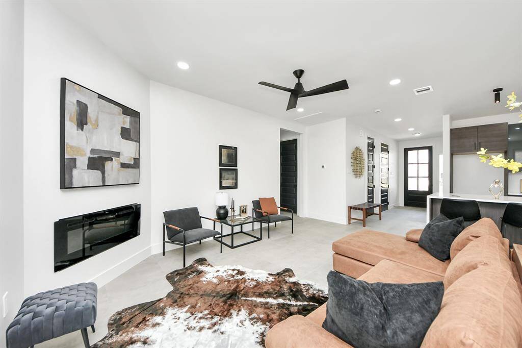 A modern electric fireplace, creating a warm and inviting ambiance!