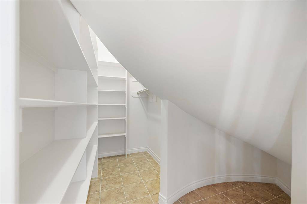 Large storage closet under the stairs.