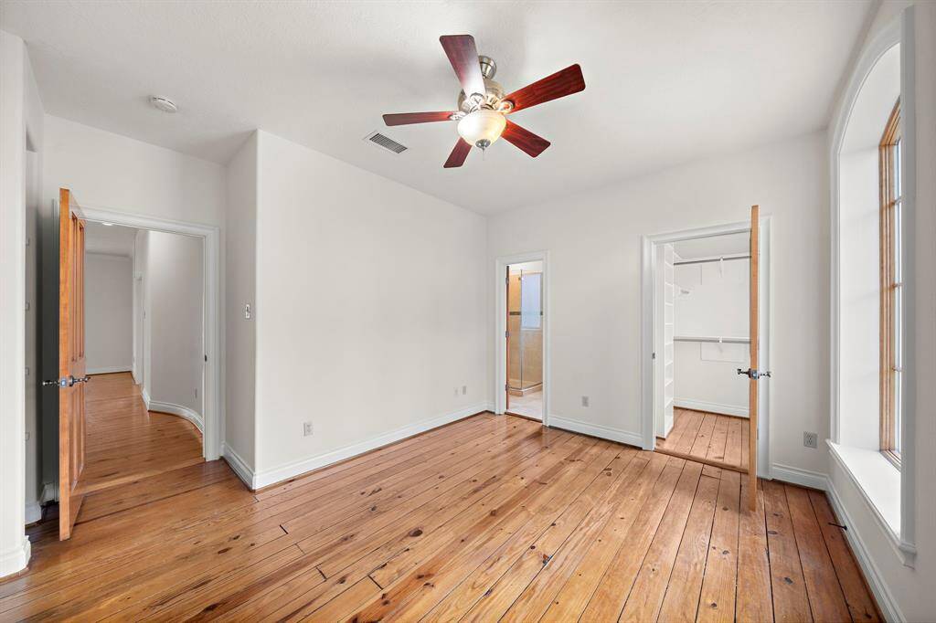 Guest Bedroom with en-suite bath and walk in closet.  There is also a door to a small room perfect for yoga, study room or exercise.