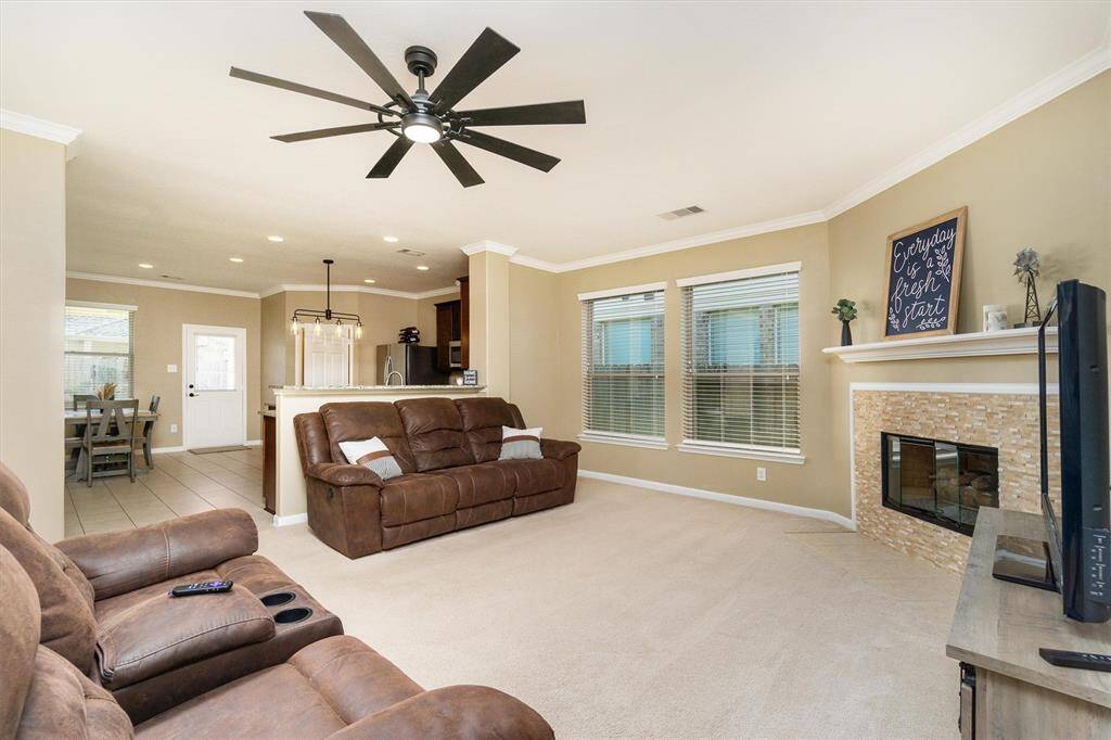 Texas-sized living room open to kitchen and dining area