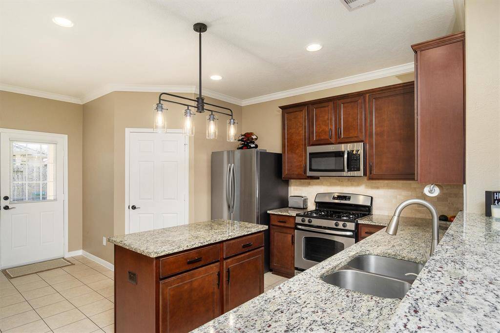 Plenty of storage space in the kitchen, updated lighting and soft close cabinets