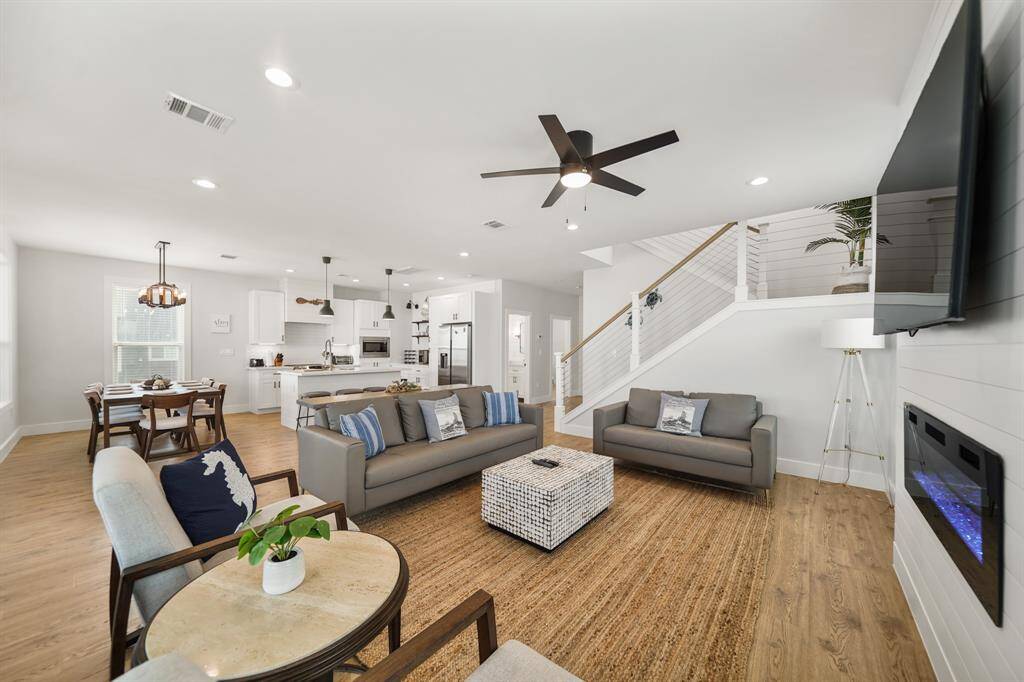 At the heart of the space, a fireplaceadds a cozy focal point, providingwarmth and charm.