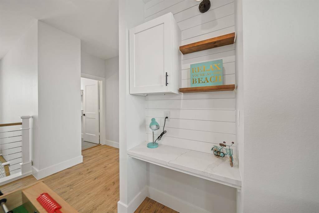 The game room has built in storage space.