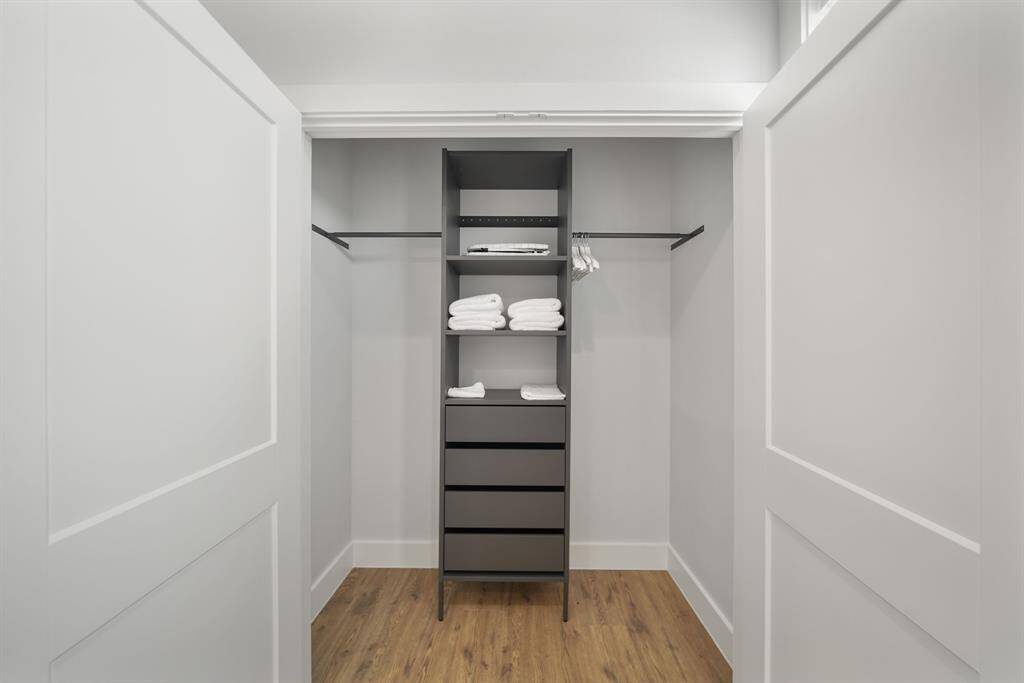 The secondary closet has plenty of storage space.