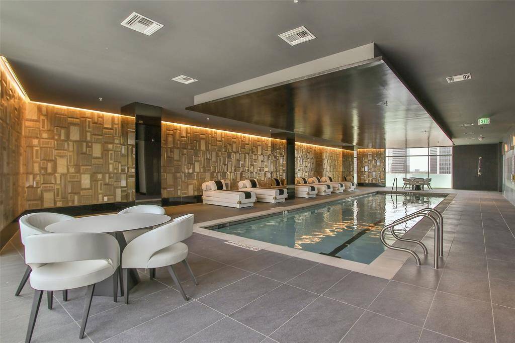 Arabella's indoor pool is accented by a magnificent wall of stained glass. Additional features include an indoor aquatic area with a dry sauna, dog salon and massage room.