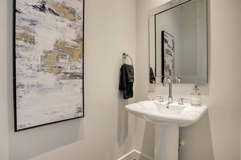 Half Bath with beautiful vanity.