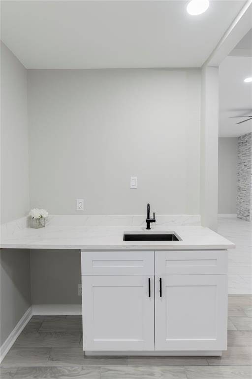 Stylish bar area with built in sink.