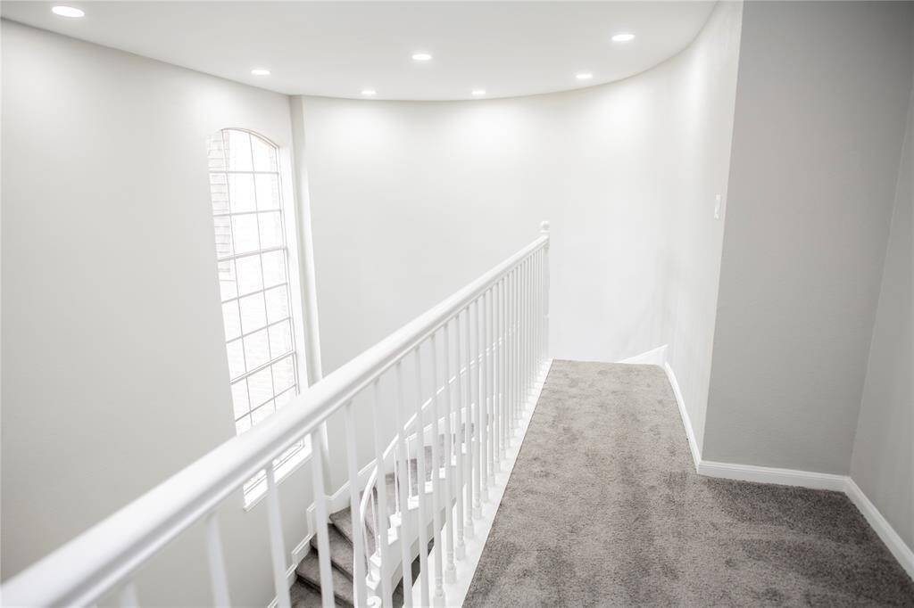 Expansive Hallway with natural light.