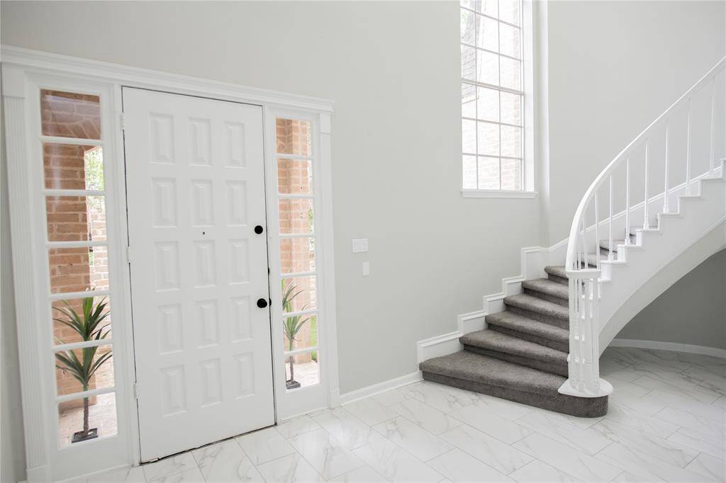 Grand Entry with oversized front door.