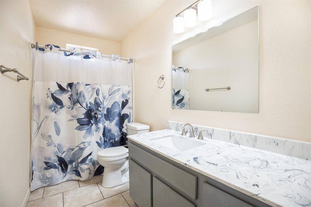 GUEST BATHROOM WITH NEW VANITY TOP AND FAUCET