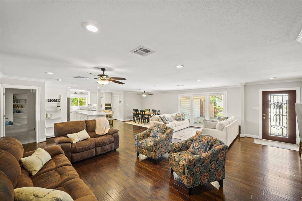 The House boasts an Open Flowing Floorplan that is both Stylish and Functional.