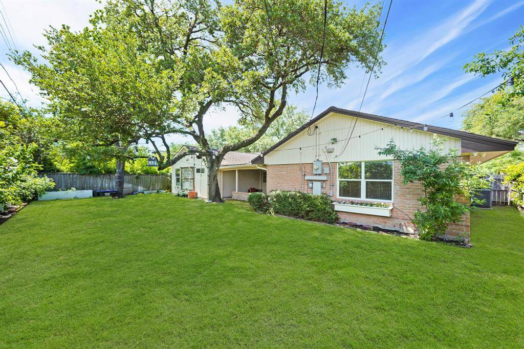 The Shady Backyard also features an 8' (Approximate Height) Privacy Fence along the Rear of the Backyard.