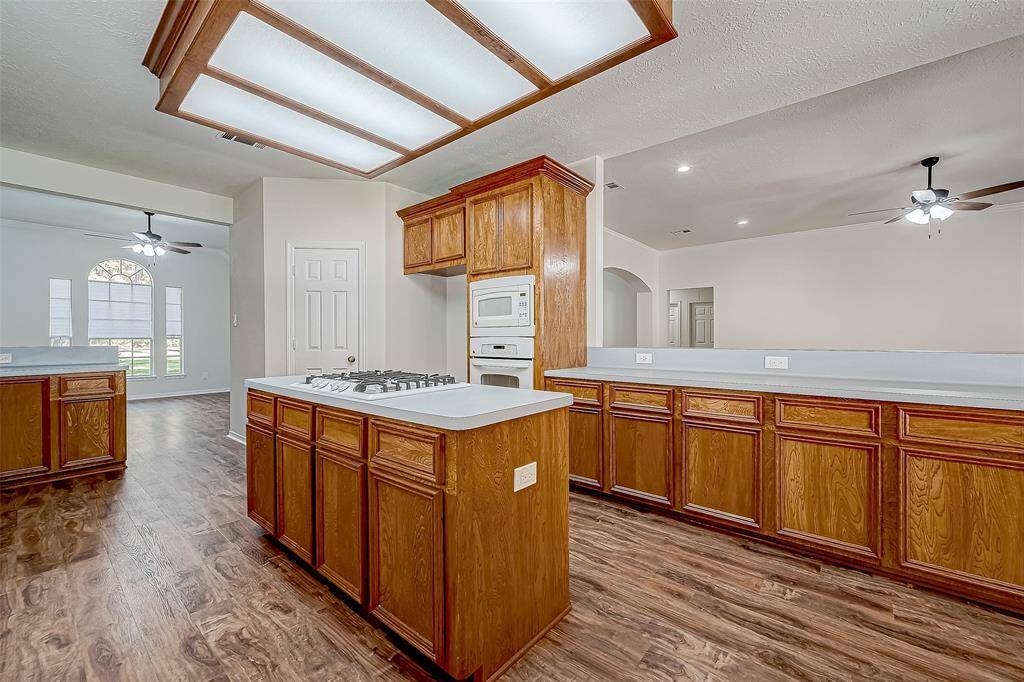 Yes more kitchen cabinets  and gas stove top island