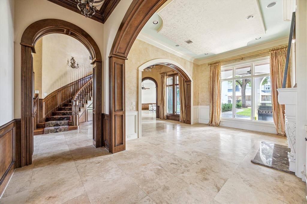 Leaving the first floor bedroom, this is a view of the sitting area, heading toward the family room.