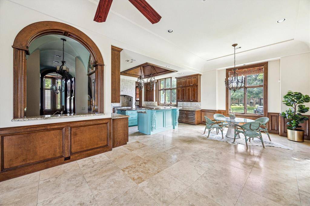 Wine room is on the left, and the kitchen opens to the breakfast nook.