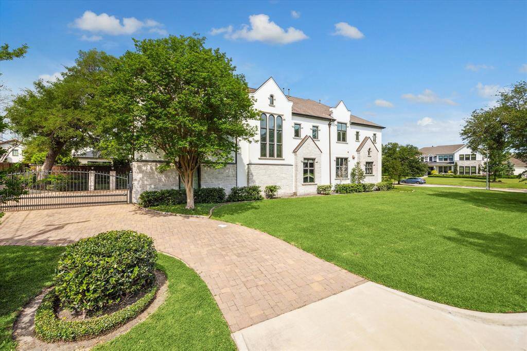 This stunning 5-bedroom, 7-bath home offers over 8,000 SF of luxurious living.